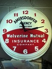 Vintage Wolverine Mutual Insurance Company Lighted Clock