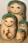 Vintage Russian Nesting Dolls Hand Painted Colors 5 Piece Wood Pyro Burned Glitt
