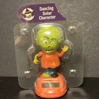 Solar Powered Dancing Bobblehead Toy New - Halloween Waving Zombie