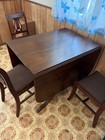 Vintage Dark-wood Duncan Phyfe Dining Table And Matching Chairs Featuring