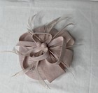 Pink Fascinator Hat Made Of Sinamay Fabric With Feather Accents  