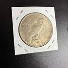 1922 - 1935  1 Peace Silver Dollar About Uncirculated Au