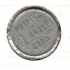 The Kelley Canning Co Iowa - Husking Corn Good For 1 Basket - Trade Token
