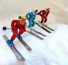 3 Vintage Barclay Lead Figures Skiers Christmas Male In Red Females Red   Blue