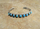 Attractive     Old Pawn Navajo Sterling Silver Nine Turquoise Design Bracelet