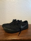 Nike Sb Check Solarsoft Canvas Low Top Lace-up Sneakers Triple Black 843896-002