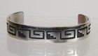 Hopi Cuff Bracelet  Silver Overlay  By Manuel Hoyungowa  ca  1953   2011 
