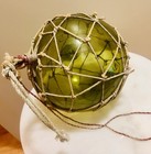 Antique Early 1900s Hand Blown Rich Green Glass Fishing Float With Netting  10in