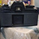 Nikon Em Black 35mm Slr Film Camera With Nikkor Series E 50mm F 1 8 Lens
