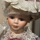 Antique Doll  10 Inch Height With Stand  Great Addition For Your Collection Used