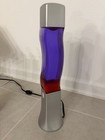 Wavy Groovy Motion Lava Lamp Silver Base Purple Liquid Red Wax