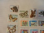 Lot Of 30 Mozambique Stamps Dogs  Sports  Butterflies  From 1970s
