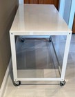 Cb2 Rolling Metal Utility Table With Locking Casters White Finish  Assembled