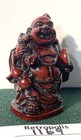 Lucky Laughing Buddha Earthbound Trading Faux Cinnabar Figurine 