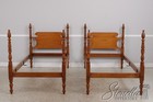 59115  Pair Of Pineapple Post Twin Size Maple Beds