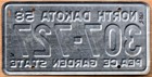 1958 North Dakota License Plate    Galvanized Steel Type With Scotchlite Sheeting