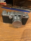 Vintage Leica Film Camera And Accessories