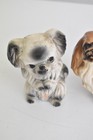 Vintage Pekingese Dog Figurines X2     Ceramic Ornaments  Marked Made In England