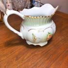 Antique Unique  Pitcher Creamer With Ascent Of Light Green On White Around Neck 