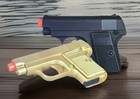 Set Of 2 Airsoft Guns Gold   Black Spring Powered Bb Pistol