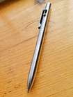 Tactile Turn Switch Pen With Pocket Clip Titanium Easyflow Ink Fidget Friendly