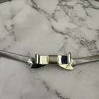 Womens Vintage 90s Stretch Metal Waist Belt Size S Silver Bow Buckle Metallic