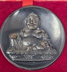 Vintage Chinese Bronze-colored Metal Medallion Featuring Buddha And Dharma Wheel