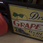 Rare 1920s Drink Grape Ola Tin Embossed Advertising Sign