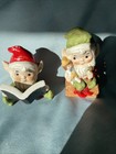 2 Vtg Ceramic Christmas Pixie Elves Gnomes Figurines Reading Toy Building Elf