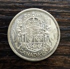 1957 Canadian - 50 Cents   Silver  800  Uncirculated