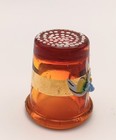 1977 Amber Colored Glass Thimble With Raised Flower Accent