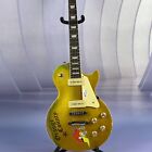 6-string Vintage Finish Metallic Gold Bird Decal Electric Guitar Maple Neck