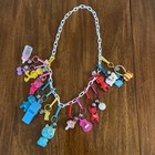 Vtg  1980 s Plastic White  Chain Charm Necklace With 14 Clip On Bell Charms