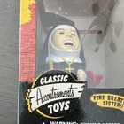 Accoutrements Nunzilla Horror Sparkling Walking Windup Fire-breathing Nun Toy