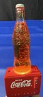 Coca Cola Bottle Sparkle Night Light Sitting On Ice Chest    ice Cold   