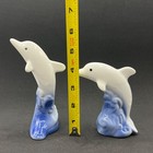 Two Dancing Dolphins White   Blue Glossy Ceramic Seascape Figurines