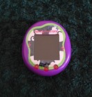 2x Tamagotchi Uni  blue   Purple      Excellent Condition   Many Extras 