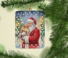 Caroline s Treasures Pomeranian With Santa Claus Porcelain Ornament Fnt1068co2