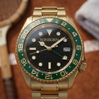 Winborn Montier Gold Tone Watch Black Dial Green 24 Hour Bezel Date Bracelet