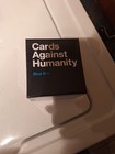 Cards Against Humanity Base Set Plus 3 Expansion Packs - Red blue green