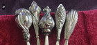 Vintage Art Deco Set Of Five Stamped Fine Silver Appy Toothpicks Diff Motifs