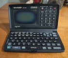 Sharp Wizard Oz-570 Black 256kb Memory Electronic Personal Organizer - Read