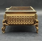Vtg Ornate Ormolu Jewelry Box Gold Filigree Beveled Glass Casket Footed Cherubs