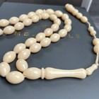 White Pressed Amber Style Misbaha Tasbih 21g   8x12mm   33 Beads
