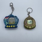 Giga Pets Digital Doggie Gold Virtual Tamagotchi And Blue Little Mermaid