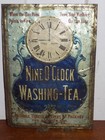 Vintage Nine O   clock Washing Tea Embossed Tin Sign