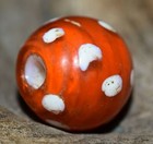 Antique Venetian Red Skunk Bead White Eyes White Heart   Core  African Trade