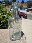 E  G  Lyons   Co  Ess  Jamaica Ginger S  F  - Embossed Medicine Bottle