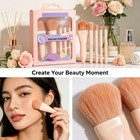 A Complete Set Of 5 Makeup Brushes 