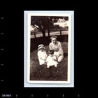 Old Vintage Photo Woman Boy And Girl Sitting On Grass Lawn Snapshot